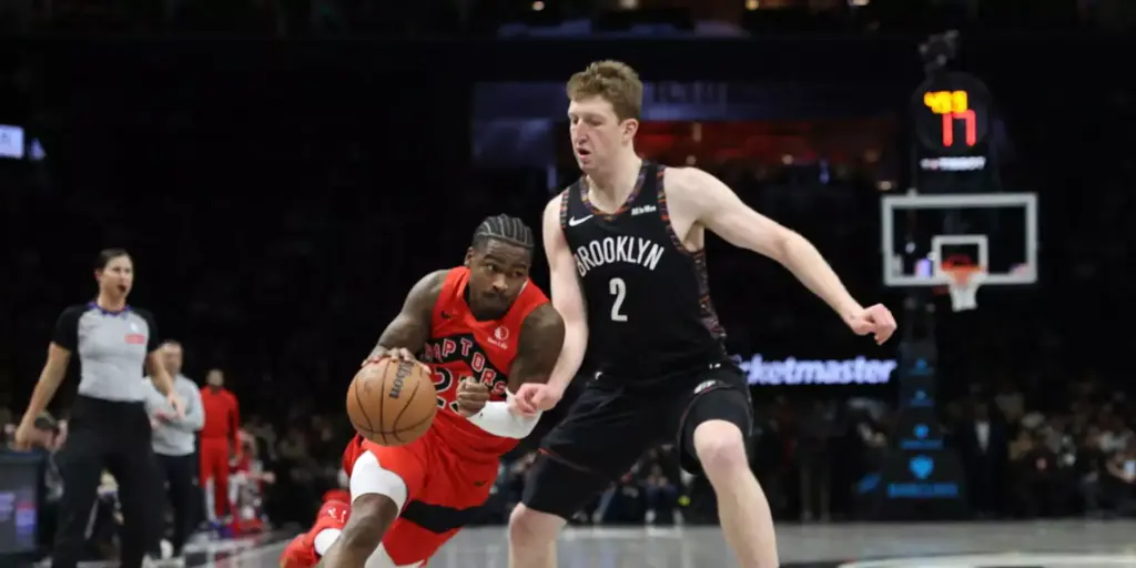 Toronto Raptors player dribbling the ball