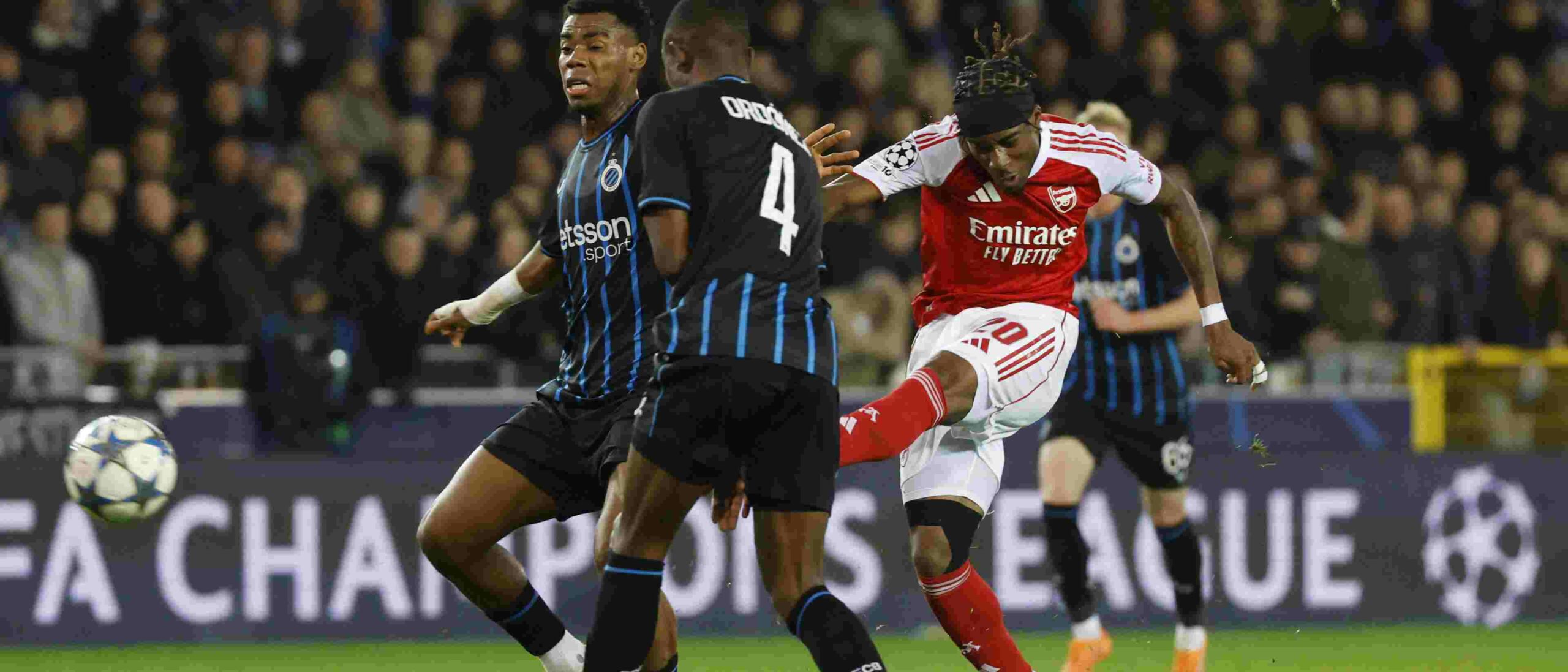 Noni Madueke shoots towards Club Brugge's goal
