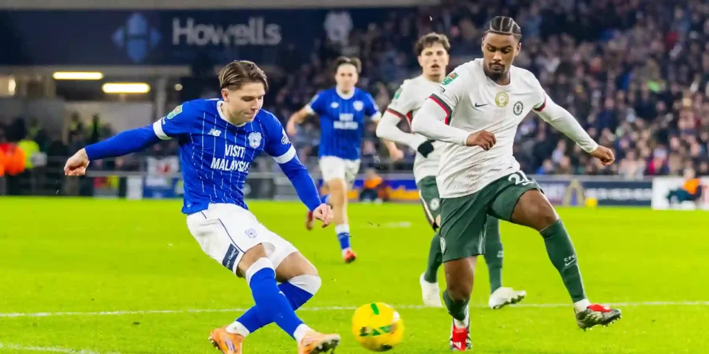 Cardiff player trying to pass the ball during the match against Chelsea