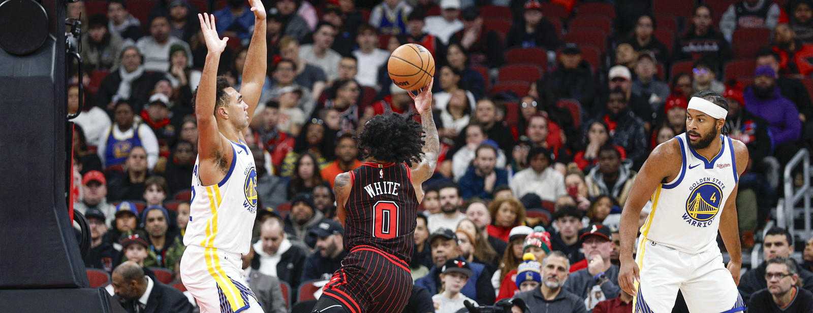 Coby White shoots at Golden State Warriors' basket