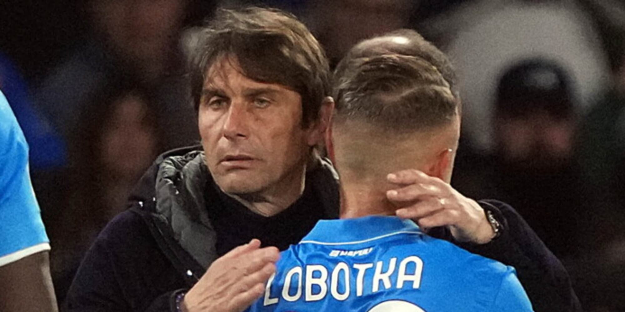 Antonio Conte gives Stanislav Lobotka a hug