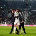 Dusan Vlahovic leaving the field with the help of Juventus' medical staff