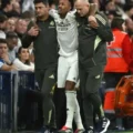 Eder Militao leaving the field with the help of Real Madrid's medical staff after sustaining heavy injury