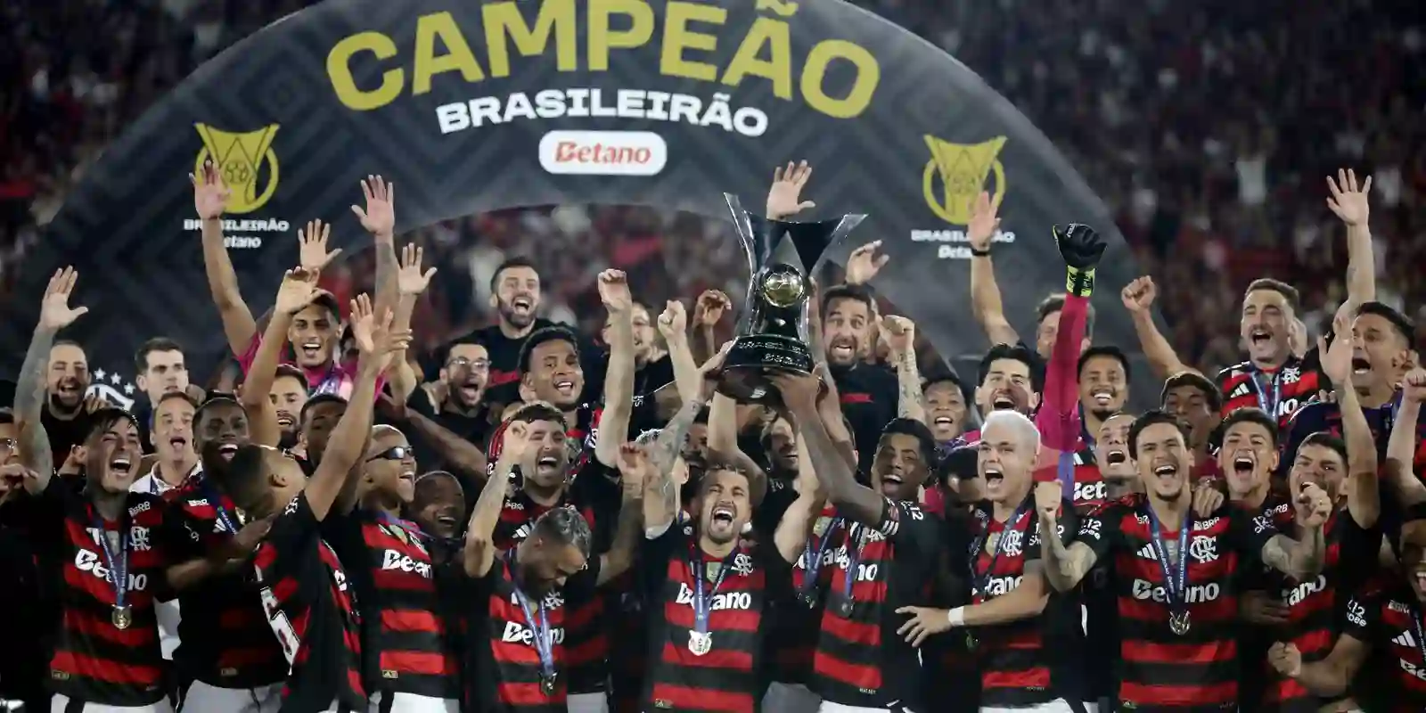 Flamengo players celebrate their Brasileiro title