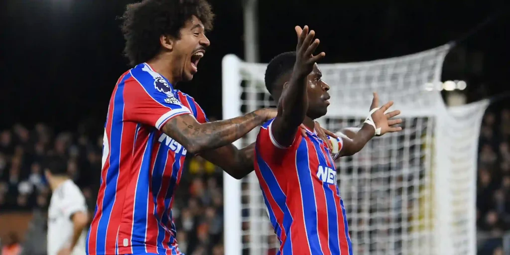 Crystal Palace players celebrate late winner against Fulham