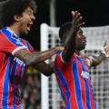 Crystal Palace players celebrate late winner against Fulham