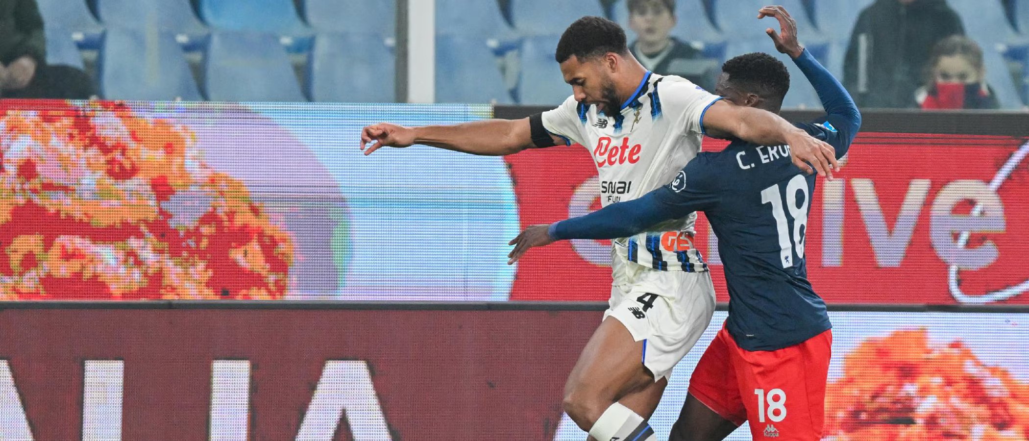 Genoa and Atalanta players in a battle for the ball