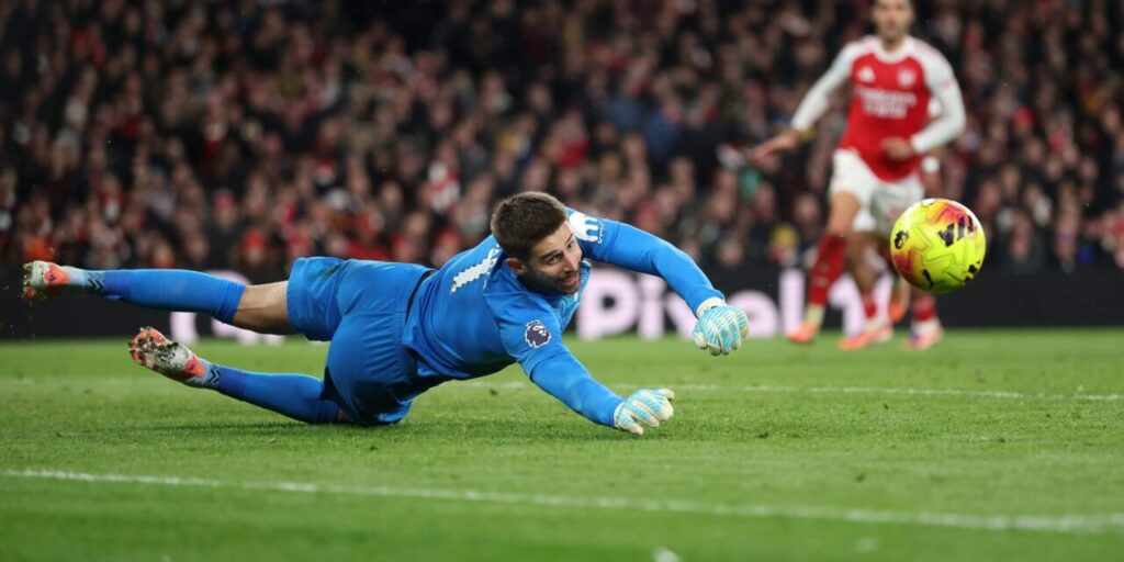 Tottenham goalkeeper Guglielme Vicario looking at the passing ball