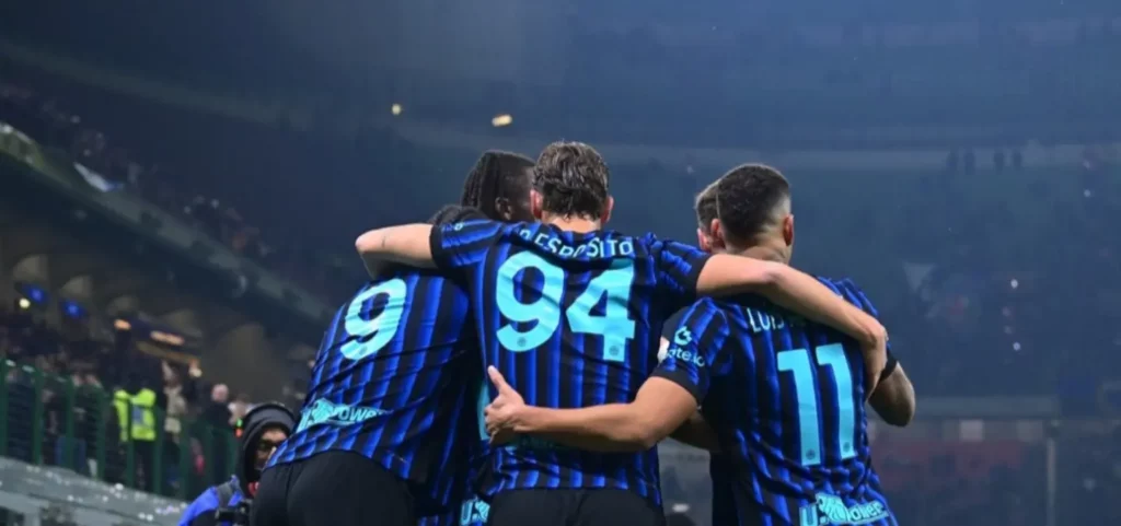 Inter players celebrate after scoring against Venezia