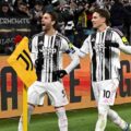 Juventus players celebrate after scoring against Udinese
