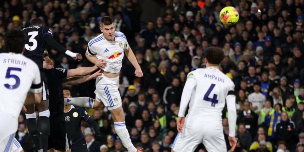 Leeds player heading the ball