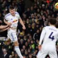Leeds player heading the ball