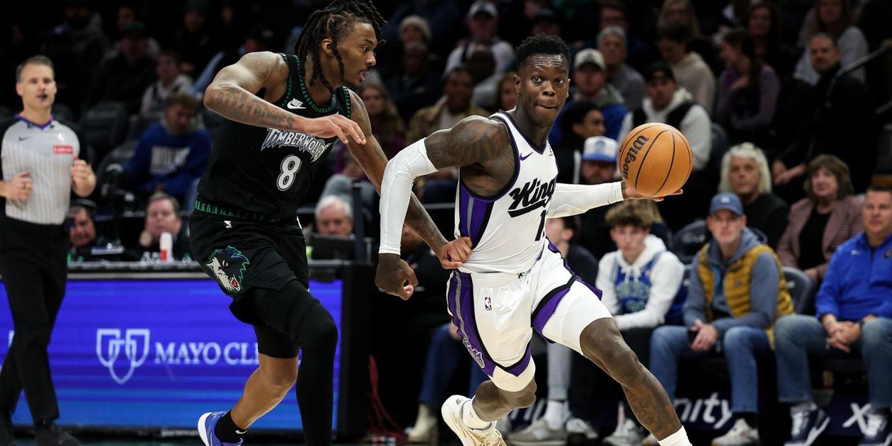 Dennis Schroeder dribbles the ball guarded by Bones Hyland