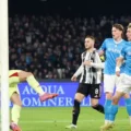 Juventus' goalkeeper parries shot from a Napoli player