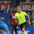 Christian Pulisic and Napoli player battle for the ball