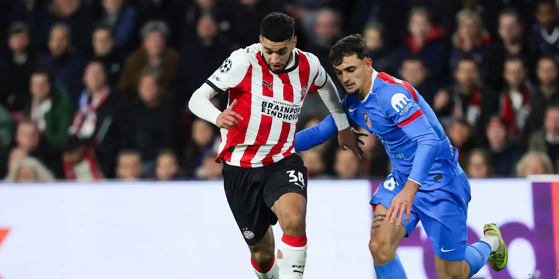 PSV and Atletico Madrid players in a battle for the ball