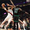 Toumani Kamara attacking Boston Celtics basket despite Neemias Queta defence