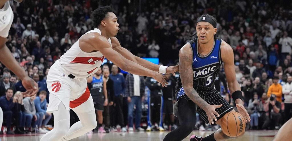 Scottie Barnes guarding Paolo Banchero