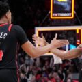 Toronto Raptors players congratulate one another