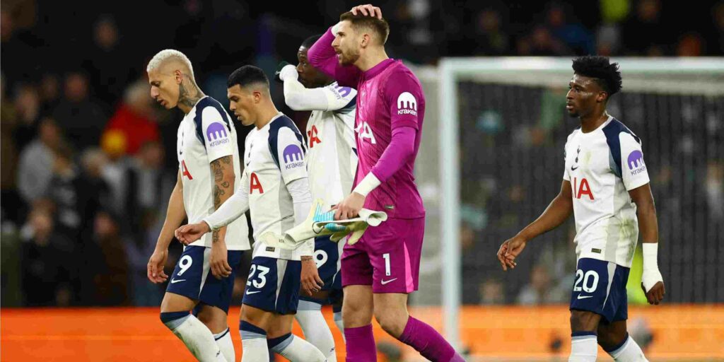 Tottenham players leaving the field together
