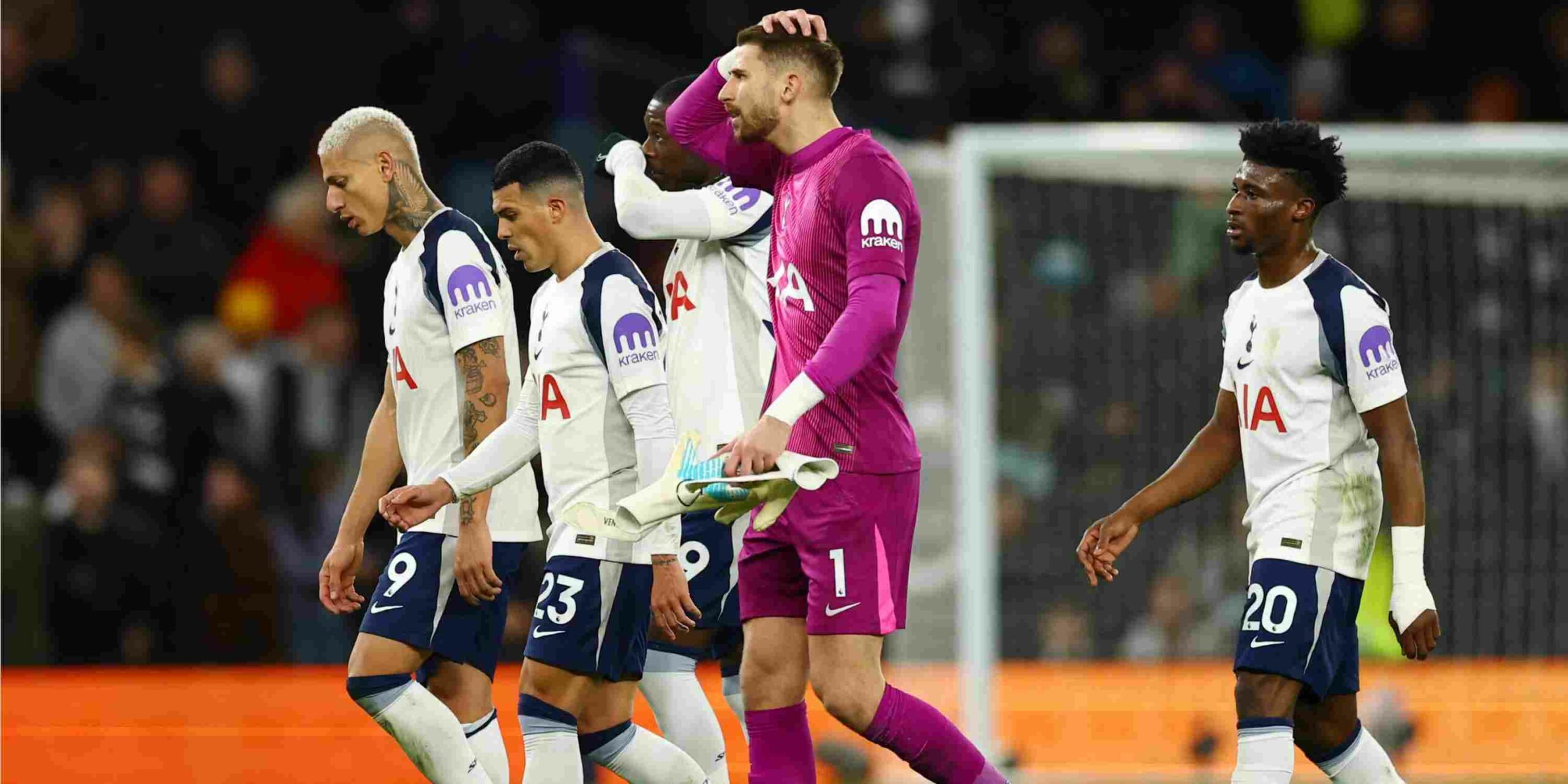 Tottenham players leaving the field together