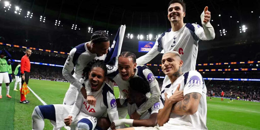 Tottenham players celebrate after scoring against Slavia