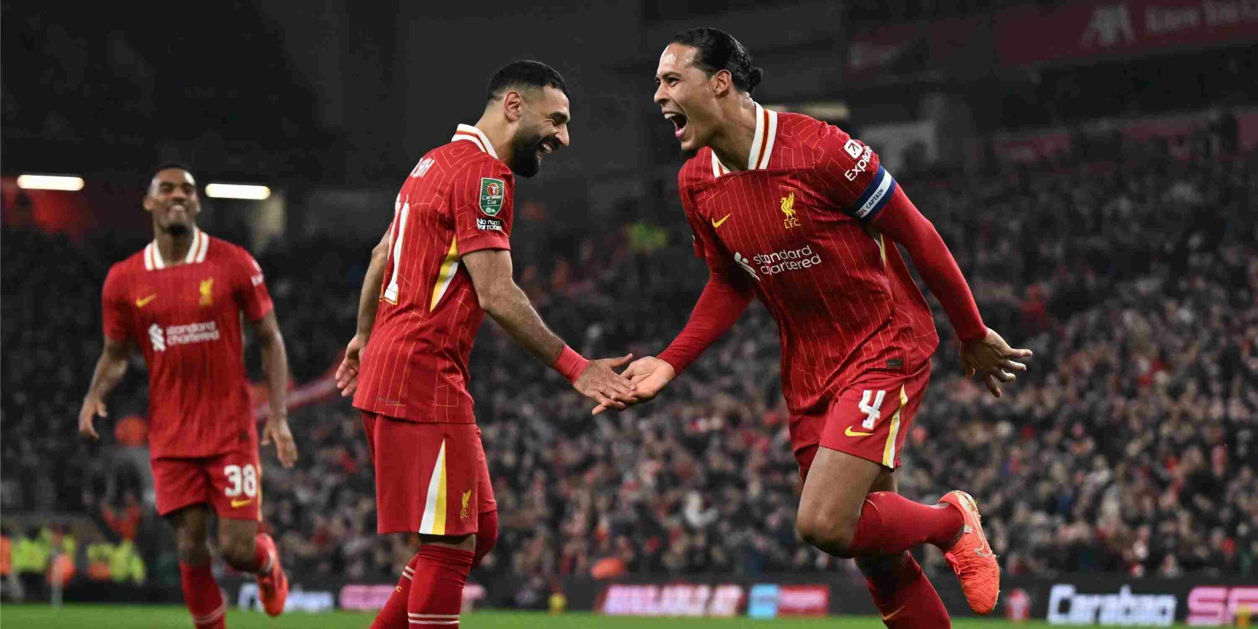 Mohamed Salah and Virgil Van Dijk celebrate Liverpool goal