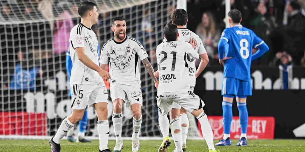 Albacete players celebrate after scoring against Real Madrid