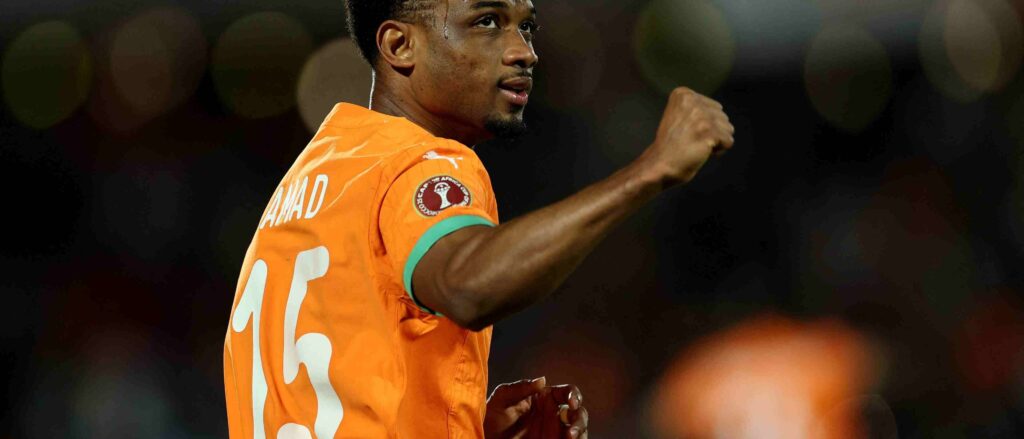Amad punches the air after scoring for Cote d'Ivoire