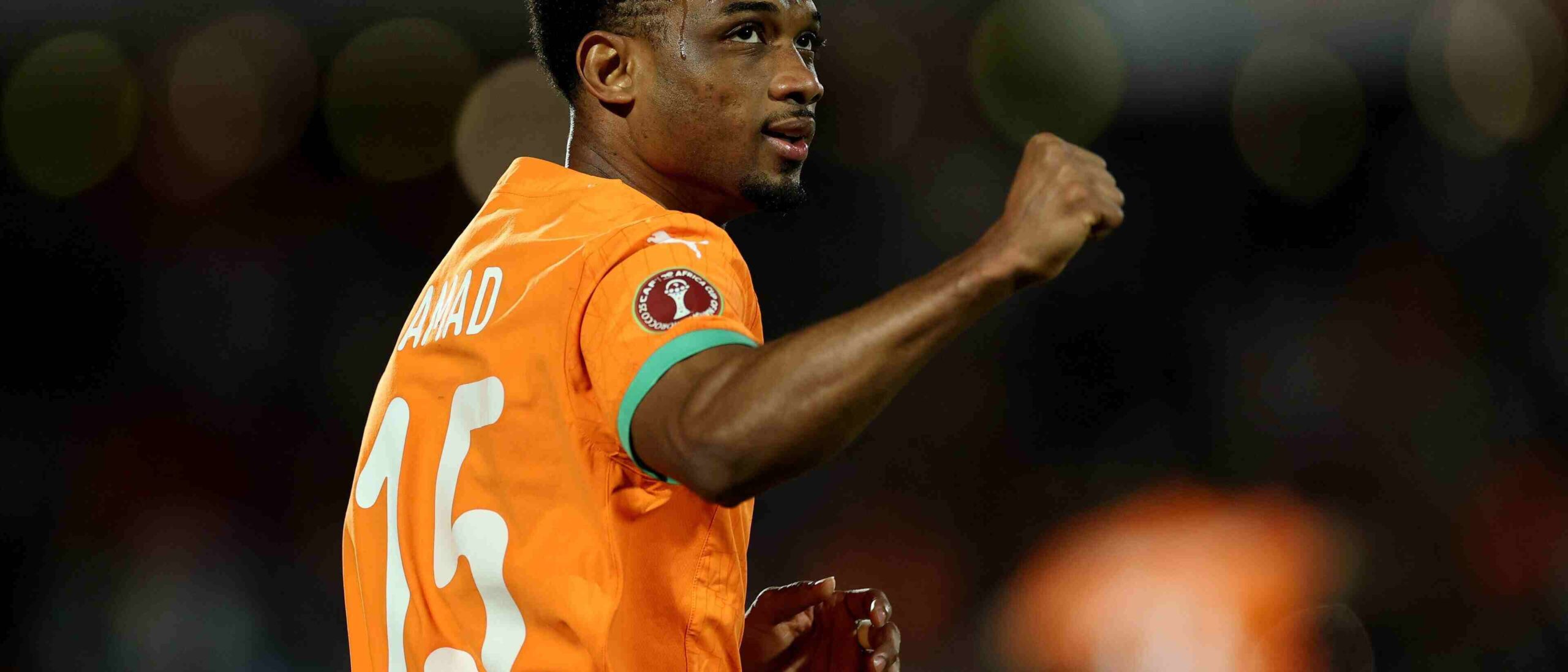 Amad punches the air after scoring for Cote d'Ivoire