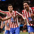 Atletico Madrid players celebrate after scoring a goal