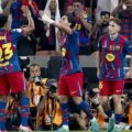 Barcelona players congratulate one another after scoring against Athletic