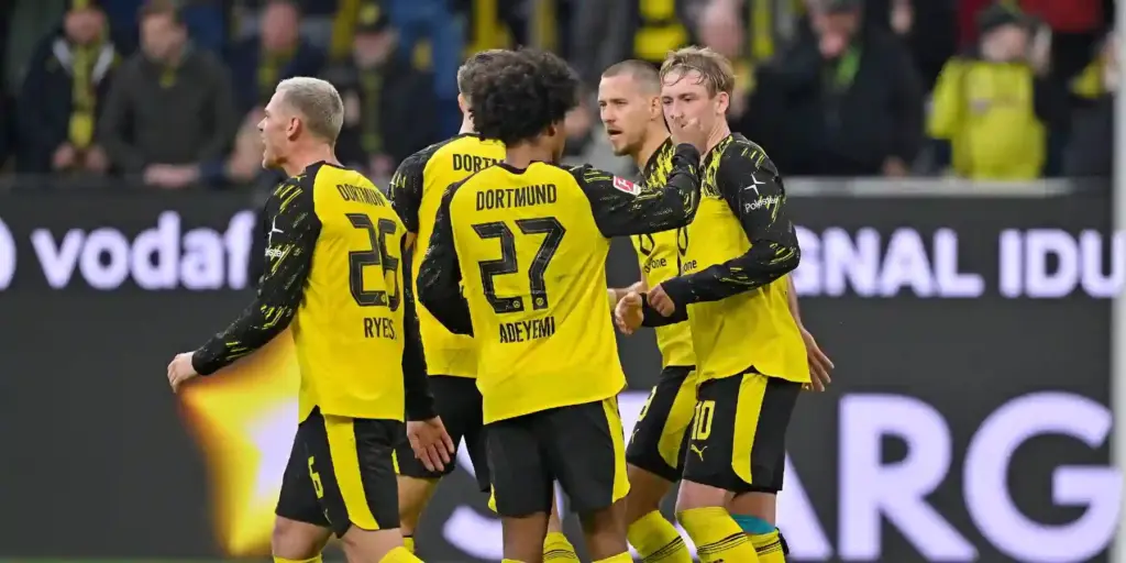 Borussia Dortmund players celebrate after scoring a goal
