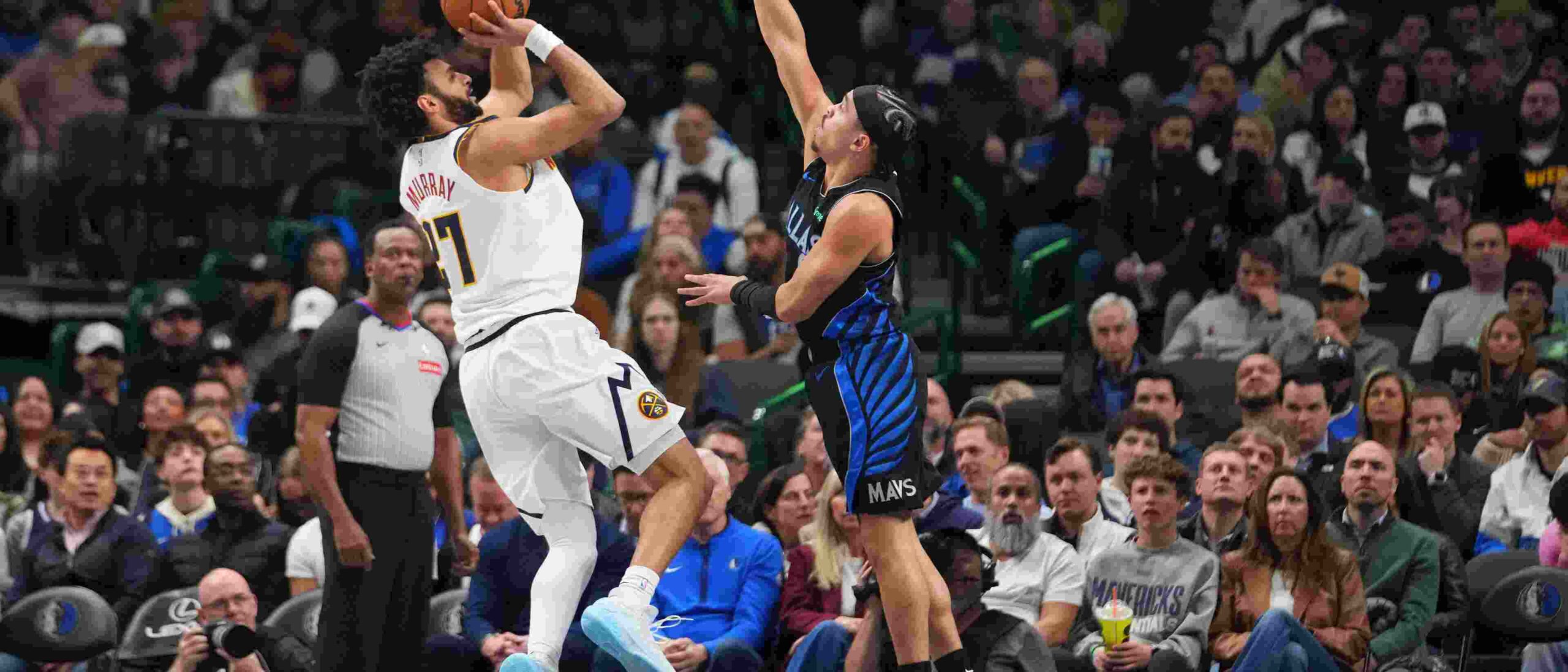 Jamal Murray shoots over Dallas Mavericks player