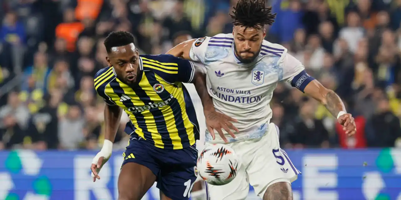 Fenerbahce and Aston Villa players in a duel for the ball