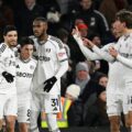 Fulham players celebrate after scoring against Chelsea