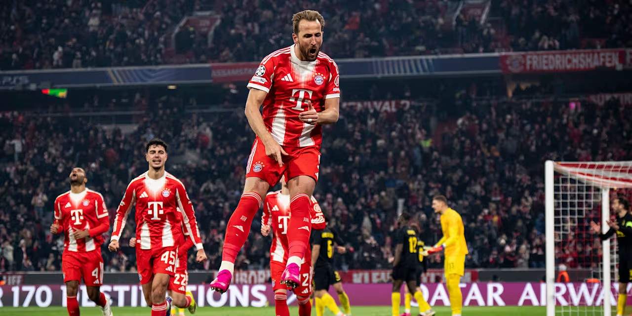 Harry Kane jumping in the air after scoring against Royal Union SG