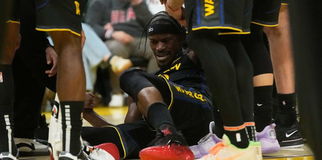 Jimmy Butler III after receiving a knee injury