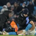 Manchester City defender Josko Gvardiol laying injured