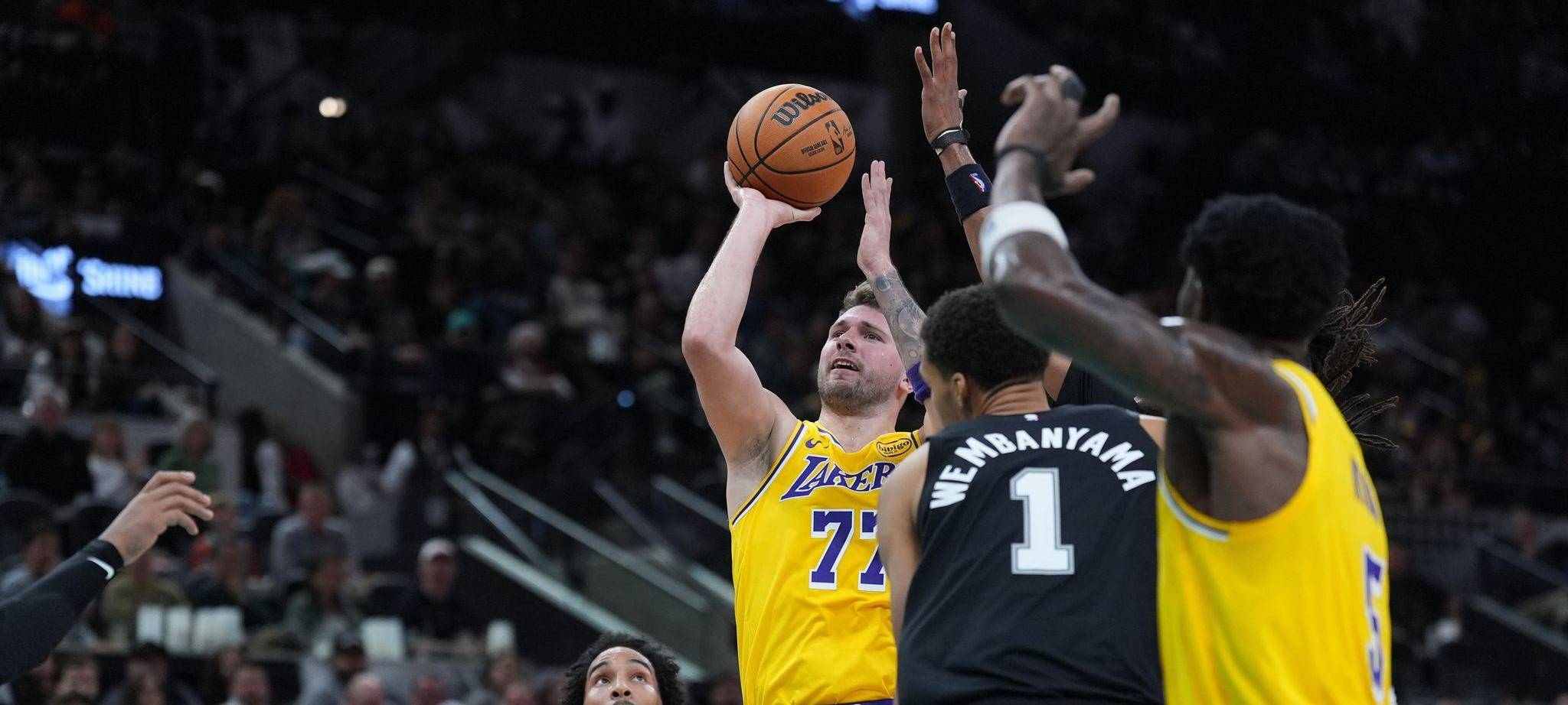 Luka Doncic shoots the ball