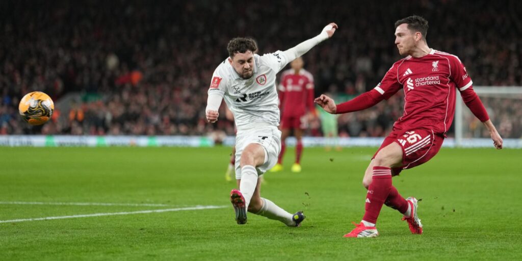 Andy Robertson crosses the ball during Liverpool's FA Cup match against Barnsley