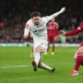 Andy Robertson crosses the ball during Liverpool's FA Cup match against Barnsley
