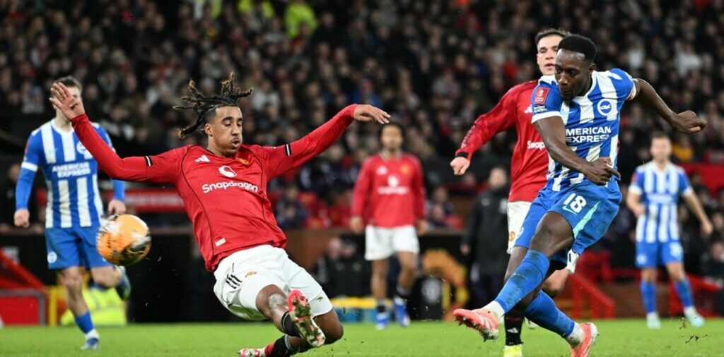 Danny Welbeck shoots towards Manchester United's goal