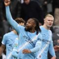 Manchester City players celebrate after scoring against Newcastle