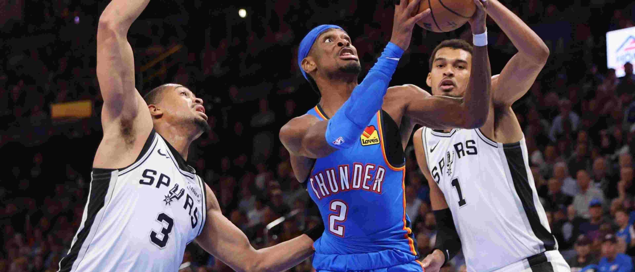Shai Gilgeous-Alexander attempts a lay up in San Antonio basket