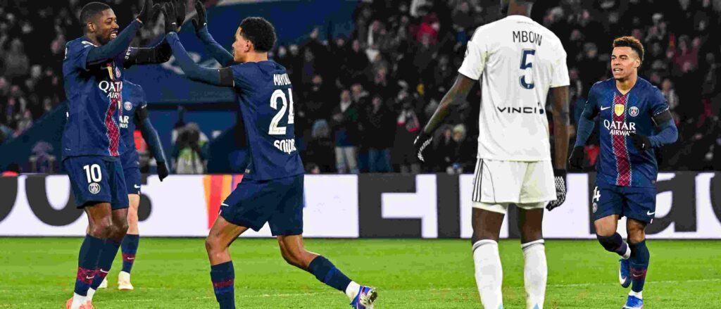 PSG players celebrate after scoring against Marseille
