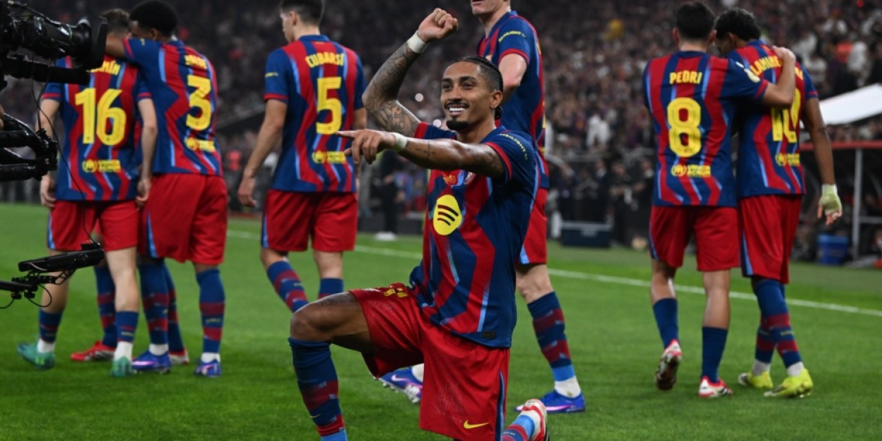 Raphinha celebrates after scoring against Real Madrid