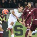 Paulo Dybala shoots towards Torino's goal
