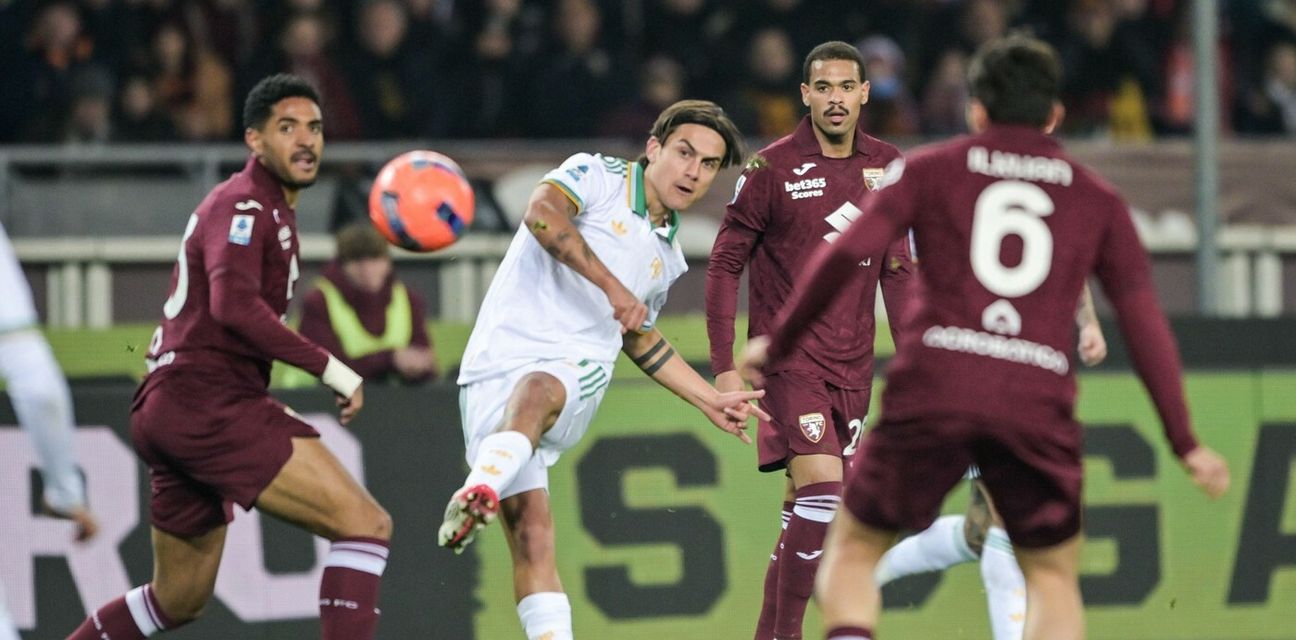 Paulo Dybala shoots towards Torino's goal