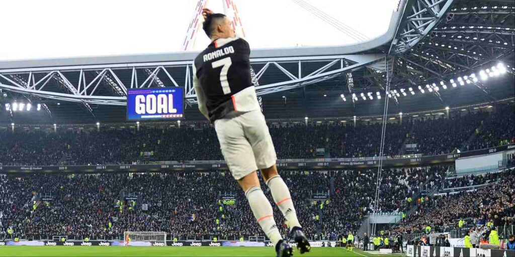 Cristiano Ronaldo jumping in the air after scoring for Juventus